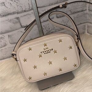Coach crossbody with Gold Stars